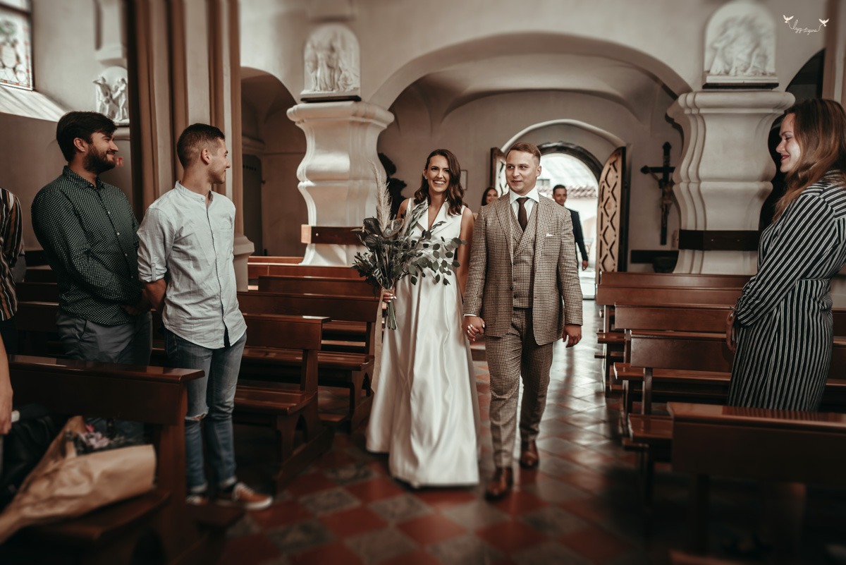 Vestuvių ceremonija Vilniaus Šv. Mikalojaus bažnyčioje